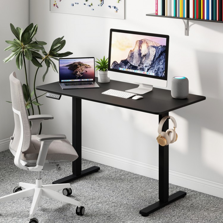 Ergonomic electric standing desk in black with a 48" x 24" surface, featuring memory settings and adjustable height for.