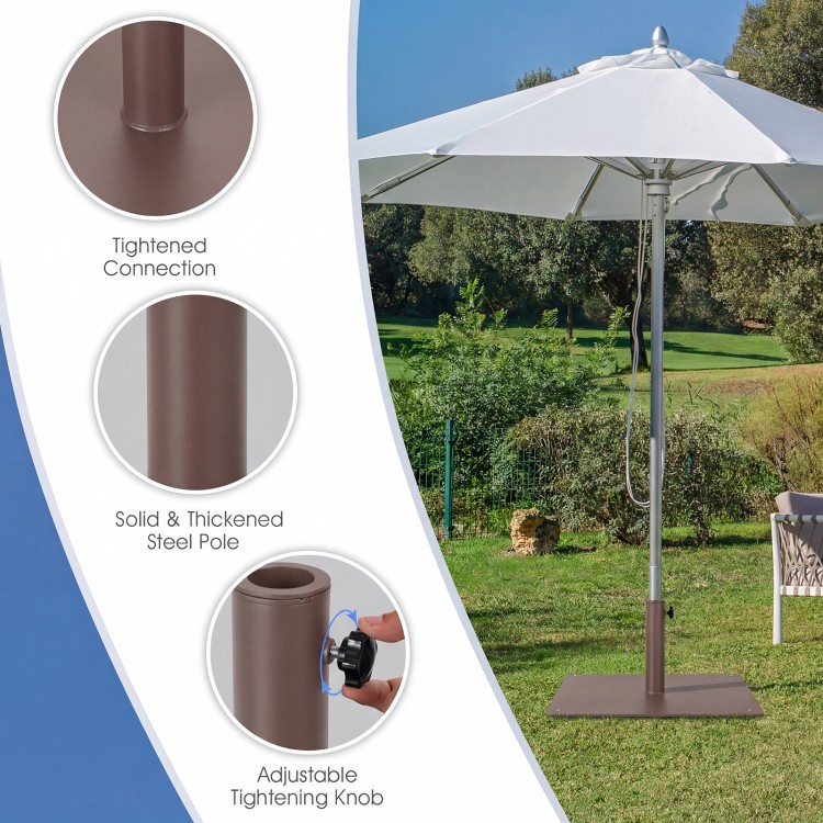Patio umbrella base stand with adjustable footpads, brown powder-coated steel, designed for stability on uneven ground.