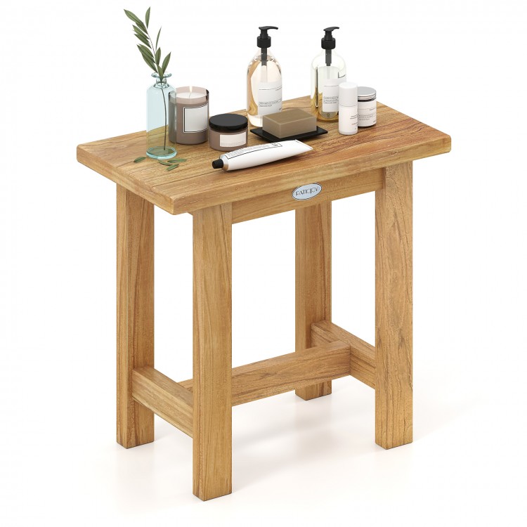 Teak shower bench with natural finish, ideal for shaving legs and versatile use in bathrooms or outdoor settings.