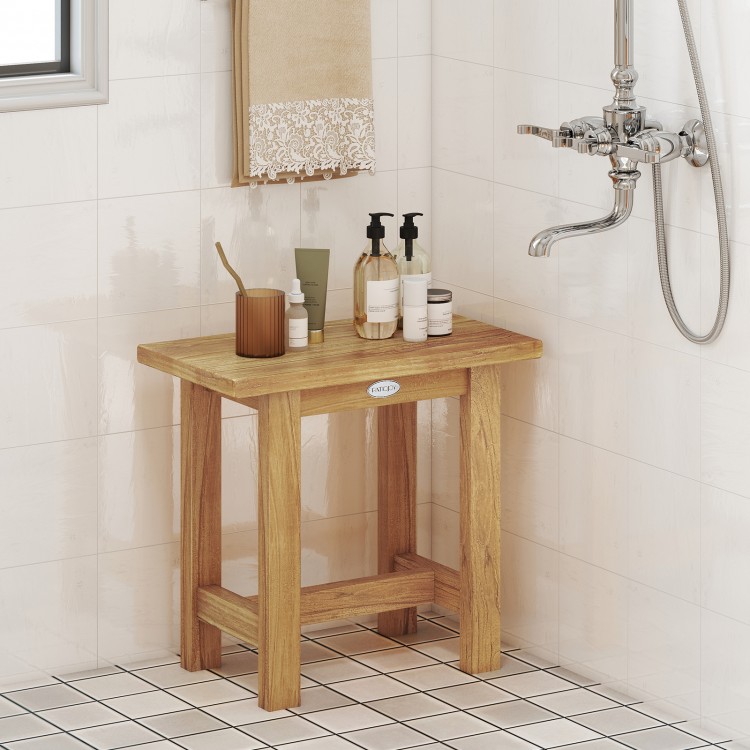 Teak shower bench with waterproof finish, ideal for shaving legs or as a side table in bathroom settings.