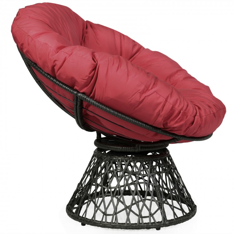 Dark red ergonomic Rattan Papasan chair with soft cushion and 360-degree swivel, perfect for indoor and outdoor use.