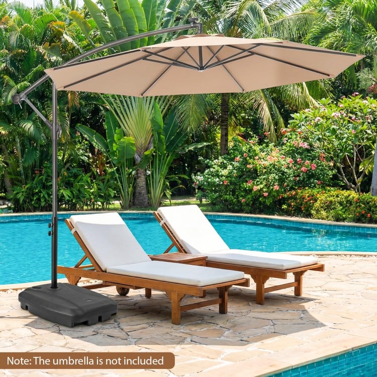 Black 220 lbs cantilever patio umbrella base stand with wheels, designed for easy transportation and stability.