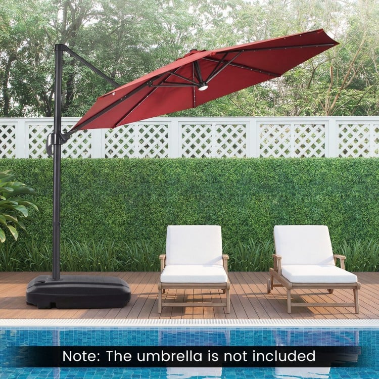 Cantilever patio umbrella base with wheels, 225 lbs capacity, T-shaped cross base for stability and easy mobility.