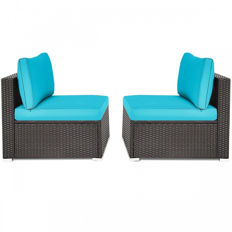 Two armless patio rattan chairs with blue cushions, perfect for outdoor spaces like patios and gardens.