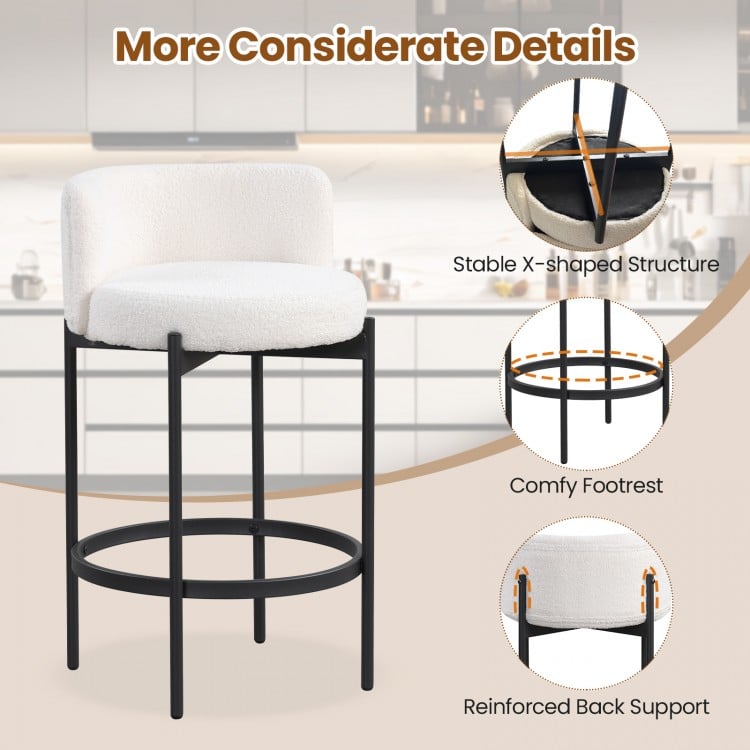 Curved backrest and comfy footrest of 24-inch boucle counter stools, ideal for kitchens and cafes.