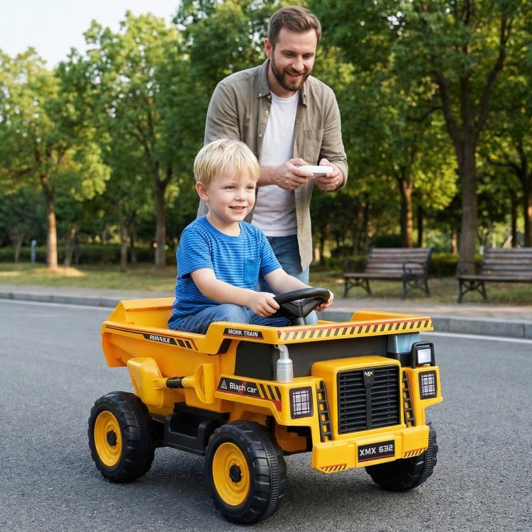 Yellow 24V construction electric vehicle with dump bed, remote control, and child driver for outdoor fun.