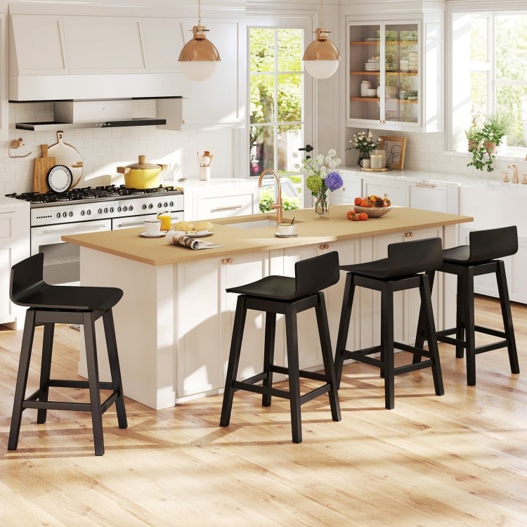Set of 4 black 24.5-inch swivel wooden bar stools with rubber wood legs, perfect for kitchen islands or dining areas.