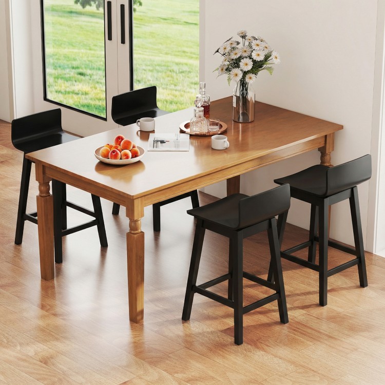 Wooden dining table with four 24.5-inch black swivel bar stools, featuring rubber wood legs and low backs for comfort.