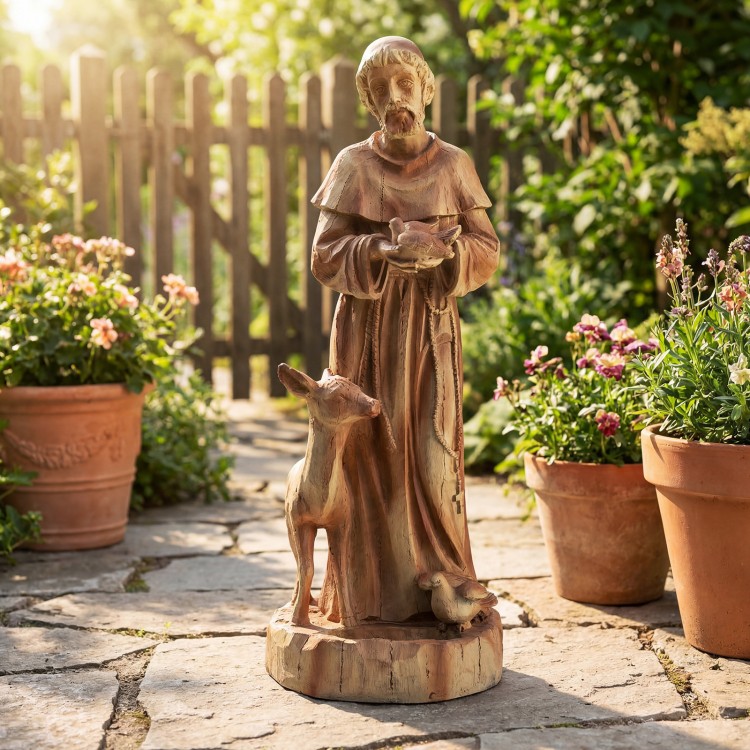 St. Francis statue with bird feeder, rustic brown finish, 24.5 inches tall, ideal for garden decoration and attracting.