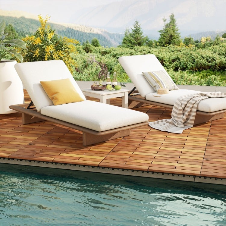 Acacia wood interlocking deck tiles arranged on a patio, ideal for outdoor use around pools and balconies.