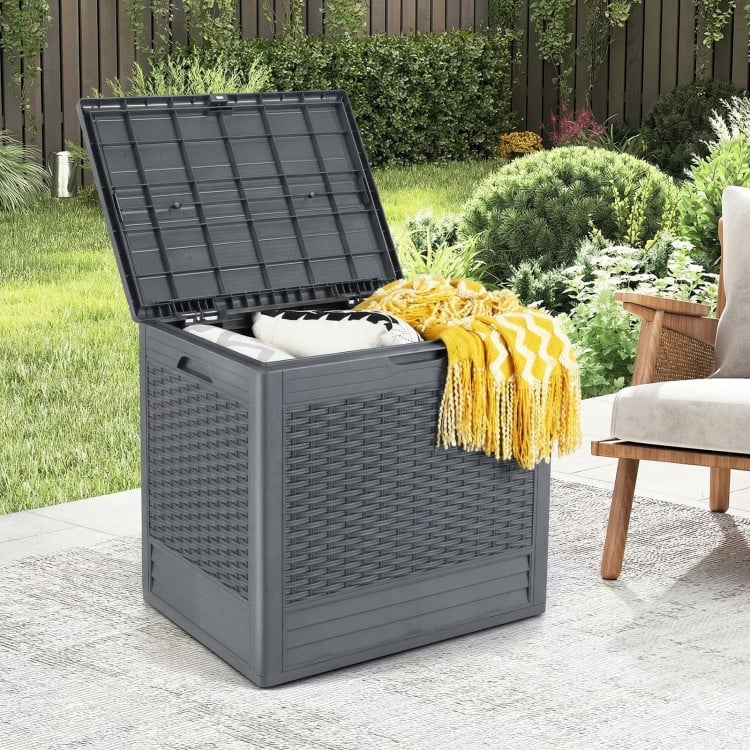 Gray 25-gallon outdoor storage box with rattan patterns, ideal for patio organization and blanket storage.