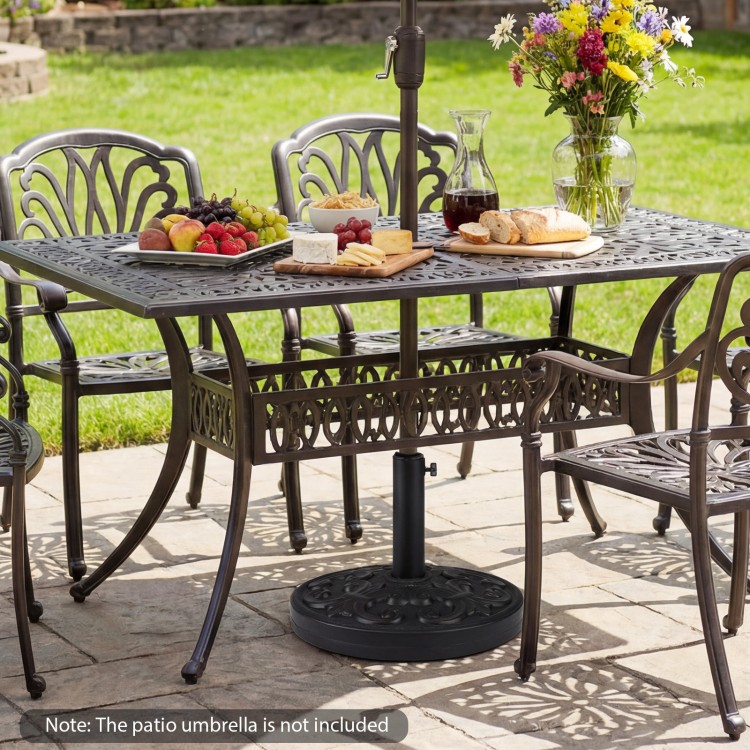Heavy-duty 26.5 lbs round umbrella stand with adjustable knob and iris pattern, designed for 8-9 ft patio umbrellas.