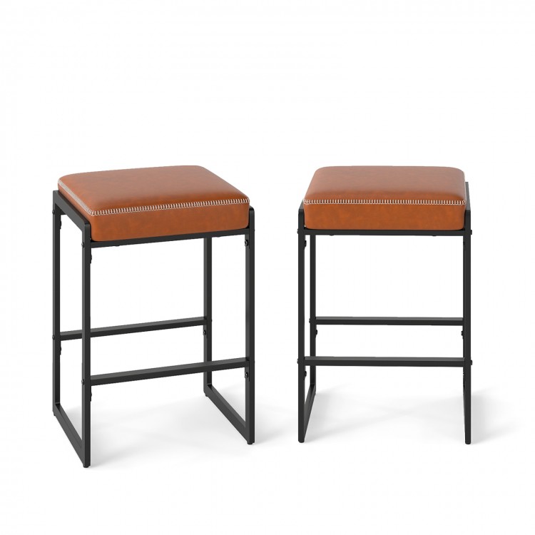 Set of 2 bar stools with brown faux leather seats and sturdy metal frames, perfect for kitchen islands and home bars.
