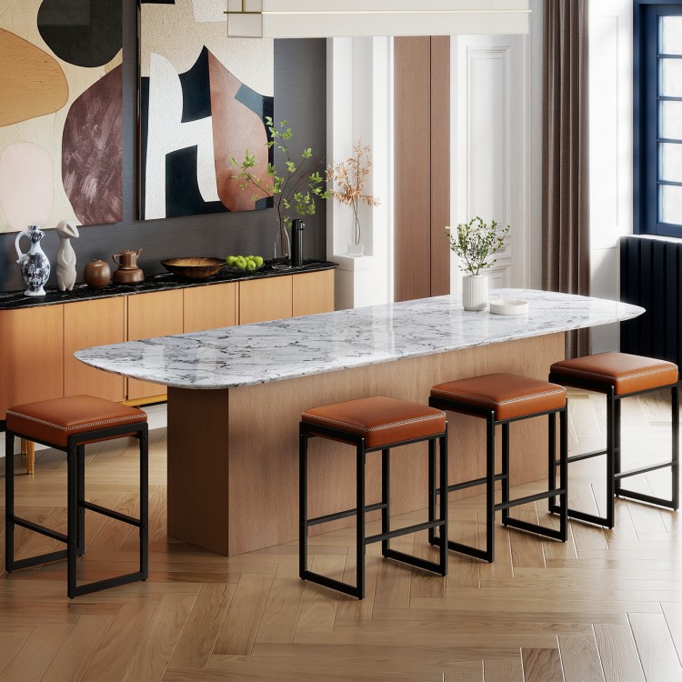 Brown faux leather upholstered bar stools with sturdy metal frames, ideal for kitchen islands and home bars.
