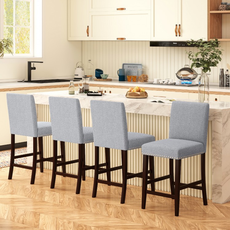 Set of two 26-inch gray counter height chairs with padded seats and backrests, ideal for kitchen islands or cafes.