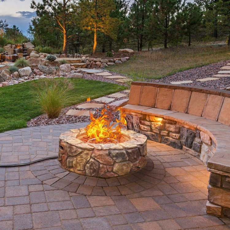 Round 28-inch propane gas fire pit with stone-brown finish, featuring decorative lava rocks for outdoor gatherings.