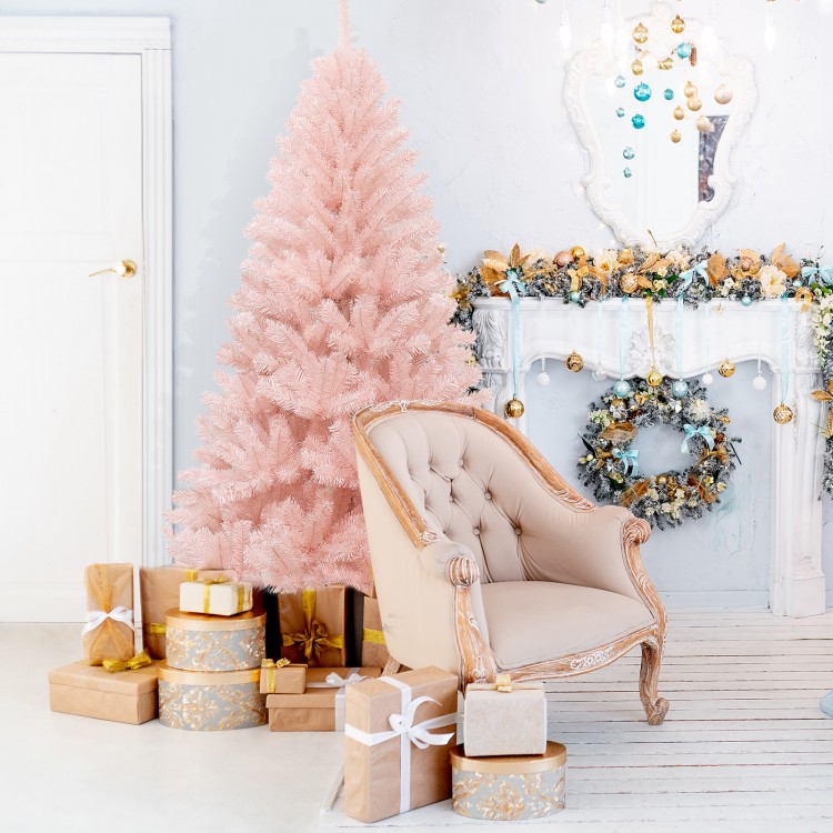 Pink 6ft artificial Christmas tree with hinged construction, surrounded by gifts, perfect for festive home decoration.