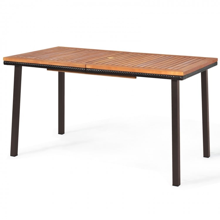 Acacia wood patio dining table with slatted surface and umbrella hole, perfect for outdoor gatherings and stability.