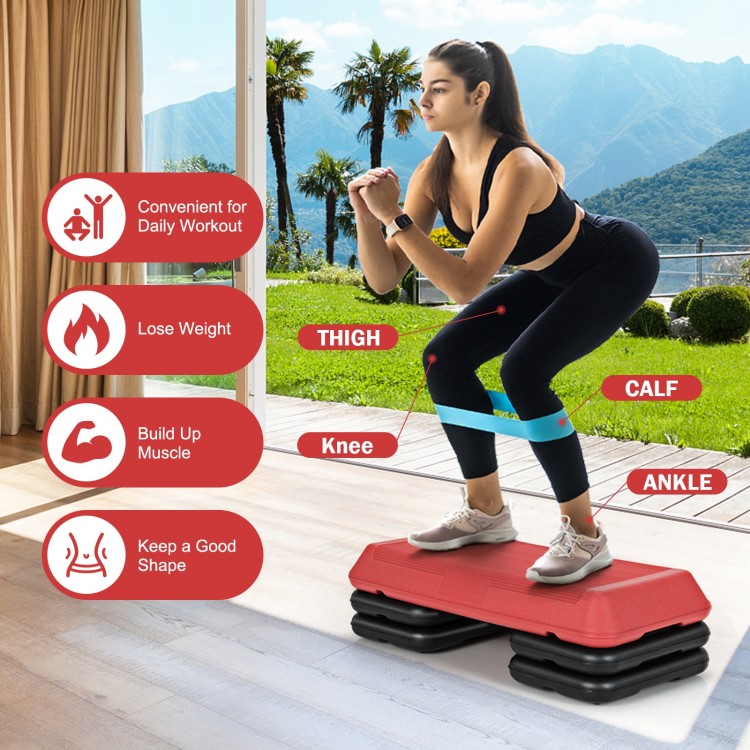 Adjustable 29-inch red aerobic stepper platform with detachable risers for versatile workouts at home or gym.