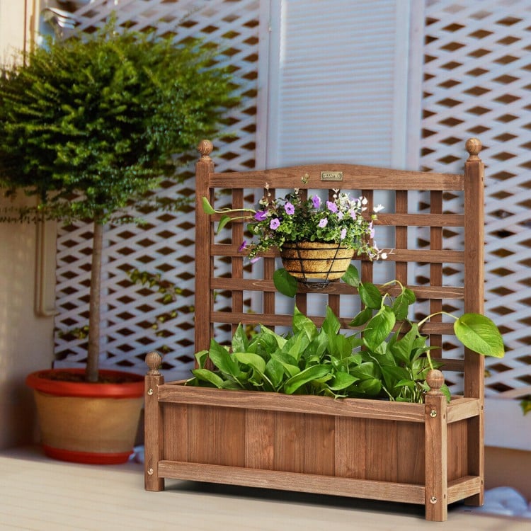 Solid wood planter box with trellis, featuring large storage space for various plants, perfect for balconies and.