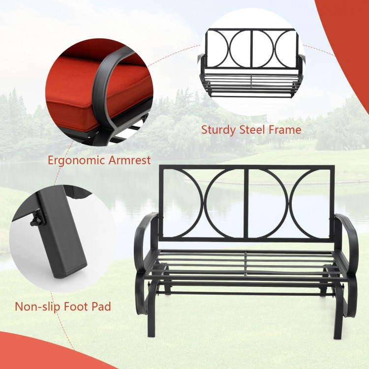 Patio 2-person glider bench with cushioned armrests, sturdy steel frame, and non-slip foot pads for outdoor relaxation.