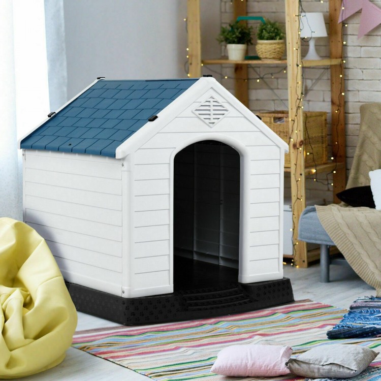 Durable plastic waterproof pet house with a blue roof, providing a safe and comfortable shelter for dogs indoors or.