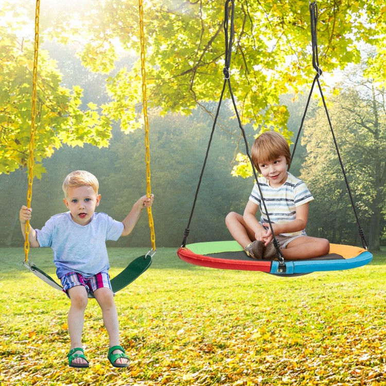 Two kids enjoying a colorful saucer tree swing and traditional swing set, perfect for outdoor fun and comfort.