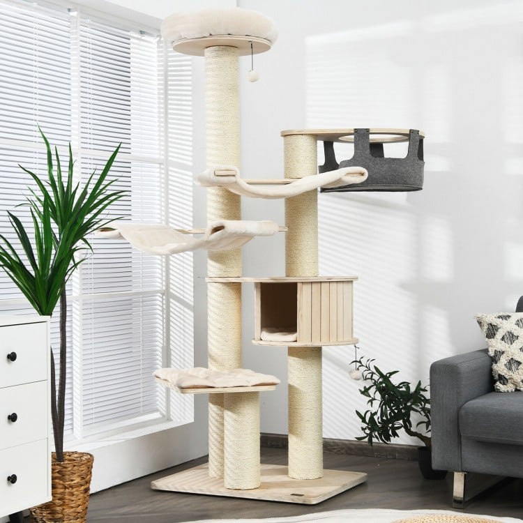 Multi-level 77.5-inch cat tree in cream white with sisal posts, plush pads, and cozy hideaway for feline fun and rest.