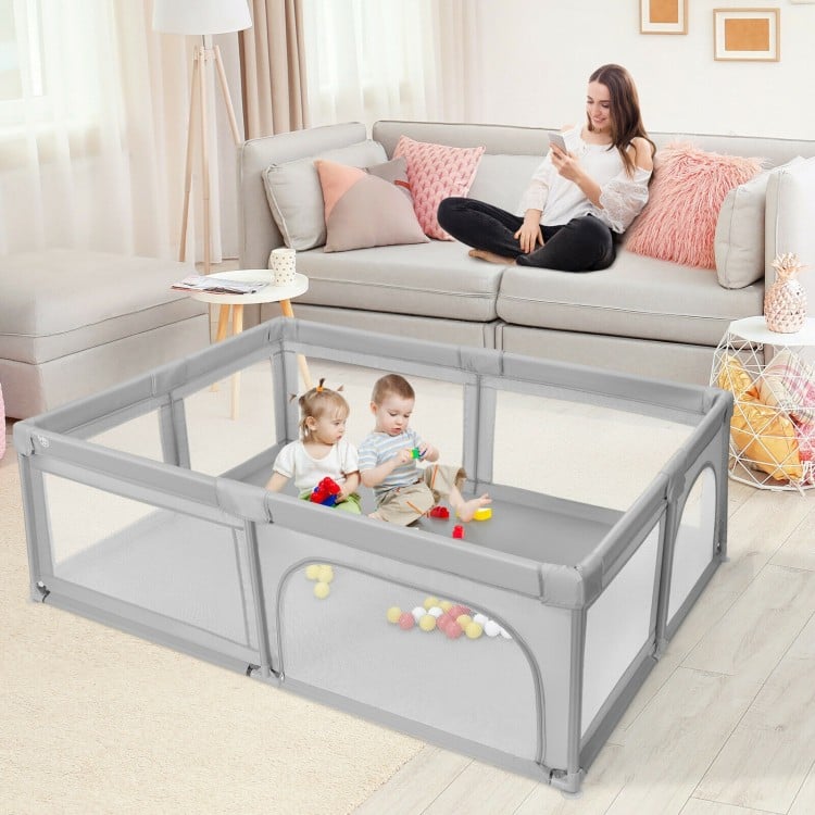 Extra-large gray safety baby fence with 50 ocean balls, providing a secure play area for toddlers to explore and learn.