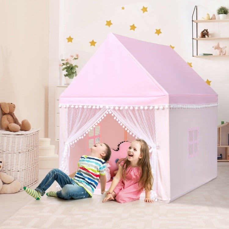 Large pink kids play tent featuring decorative doors and windows, providing a cozy space for indoor and outdoor.