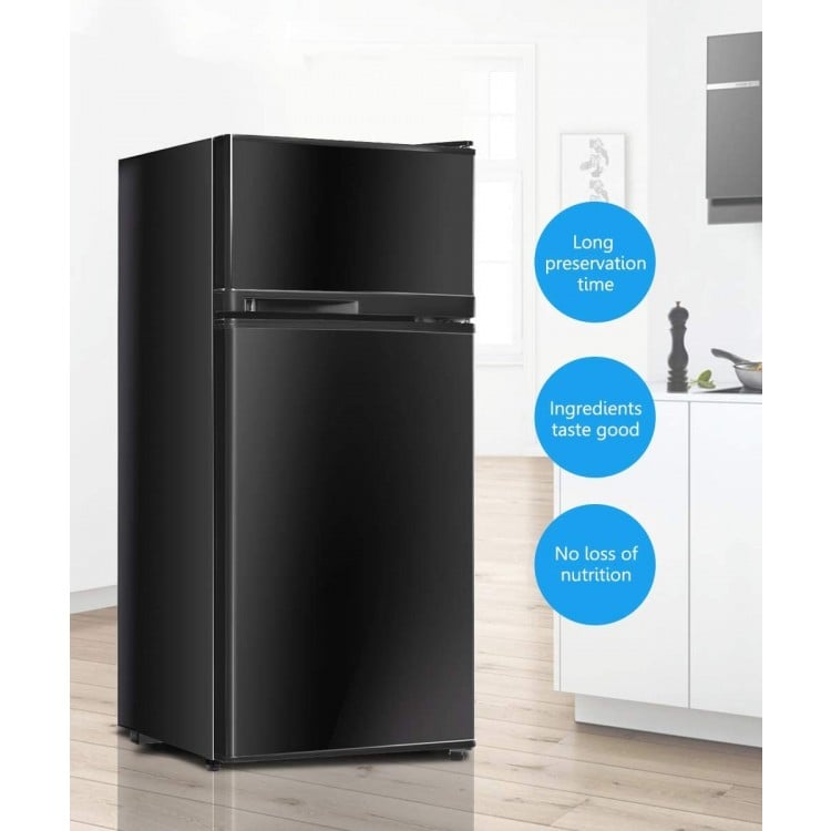 Compact black refrigerator featuring integrated door shelving and can dispenser, ideal for maximizing storage in small.