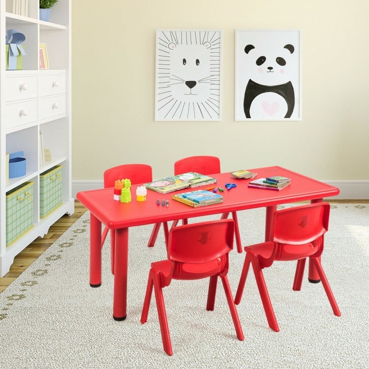Kids plastic rectangular learn and play table in red with four chairs, ideal for preschools and home use.