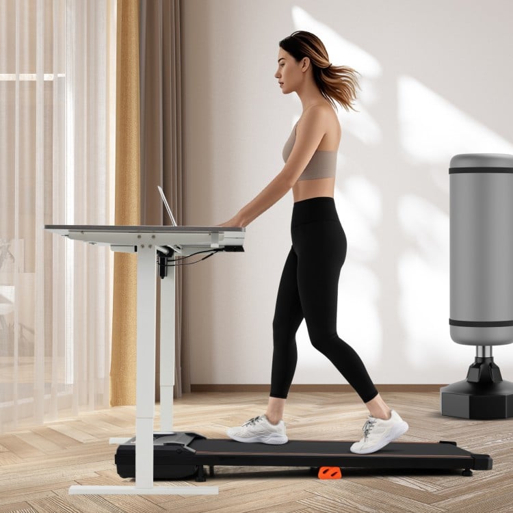 Under desk treadmill in black, featuring a 2.5HP motor, remote control, and LED display for home office workouts.