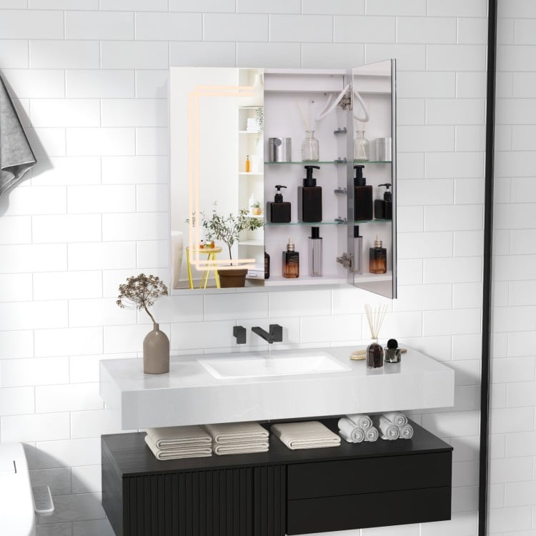 Double-sided HD mirror cabinet with lights, adjustable shelves, and anti-fog function for stylish bathroom storage.
