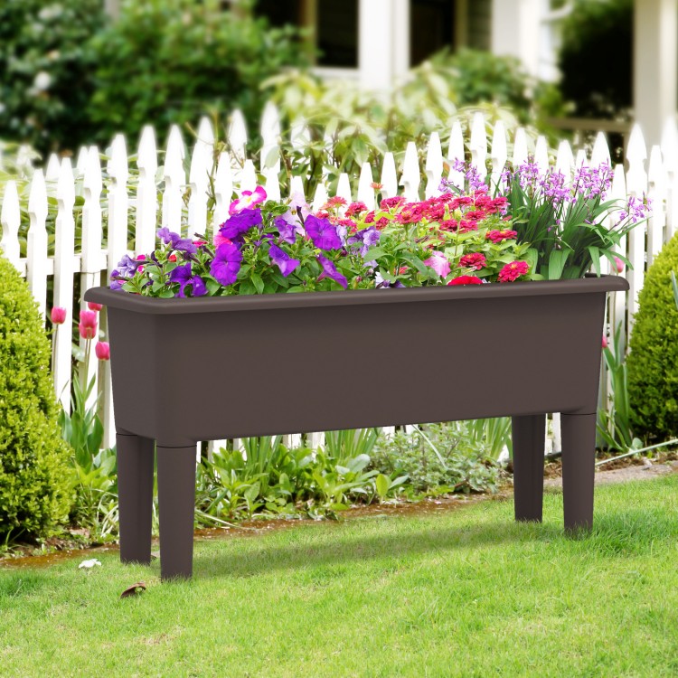 Raised garden bed in coffee color with flowers, featuring self-watering design and detachable legs for outdoor use.