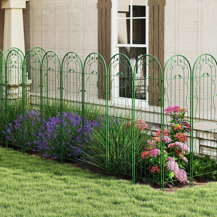 Green metal garden trellis set with floral design, 71 x 20 inches, providing sturdy support for climbing plants.
