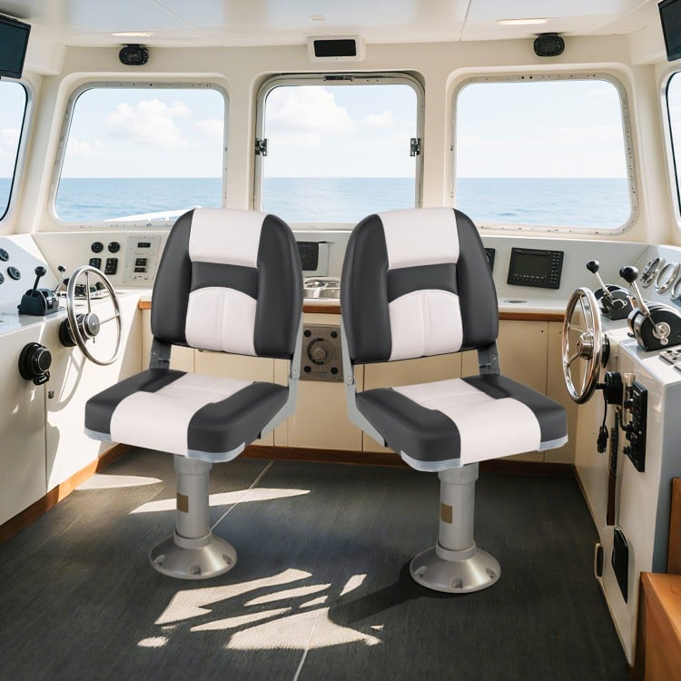 Two gray boat seats with thick sponge padding, designed for comfort and weather resistance, ideal for marine use.