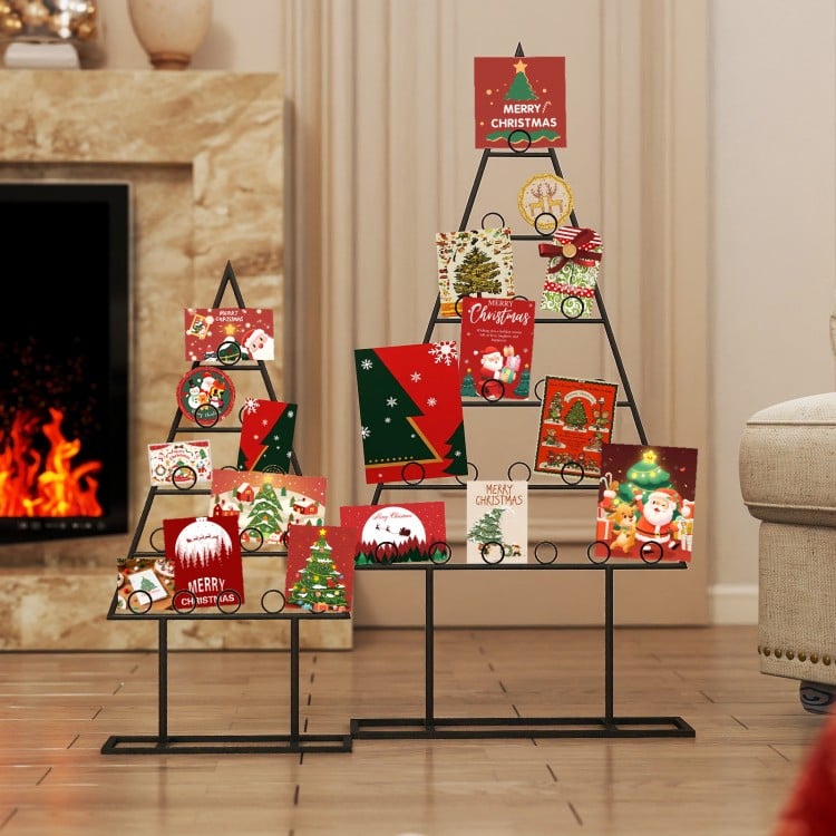 Christmas tree photo holders in black metal with 36 round clips, ideal for displaying holiday cards and photos.