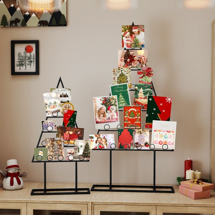 Christmas tree photo holder set featuring a black metal frame with 36 round clips, ideal for displaying holiday cards.