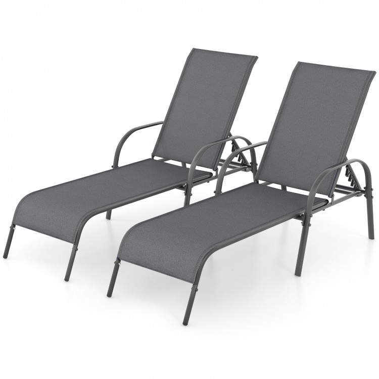 Two adjustable dark gray outdoor patio lounge chairs with breathable fabric and sturdy steel frames for poolside.