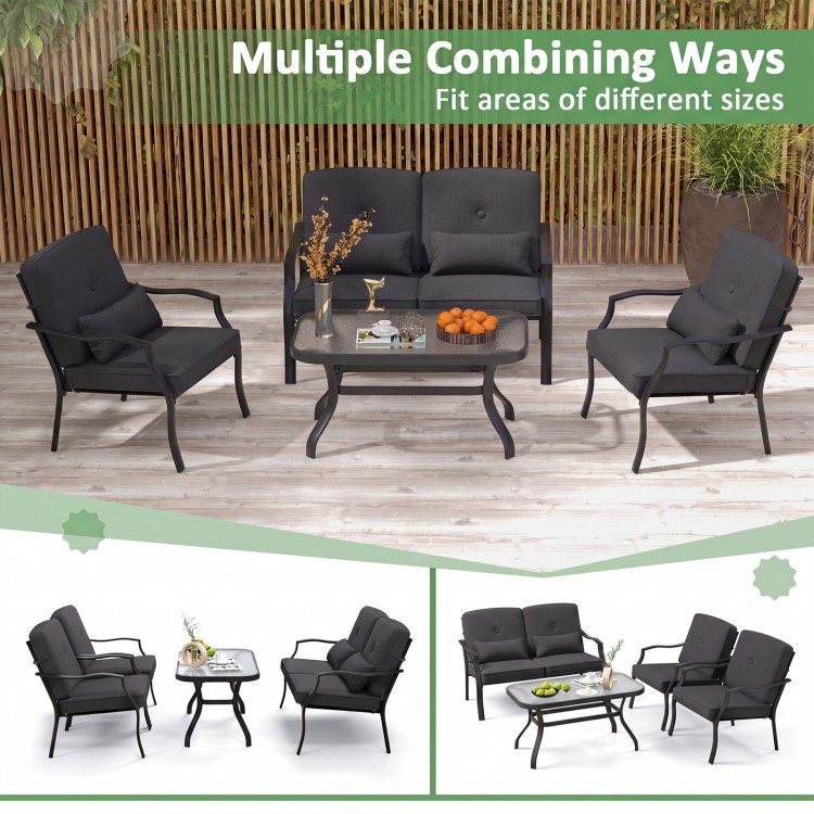Two black patio metal chairs with soft cushions, perfect for backyard or poolside relaxation.