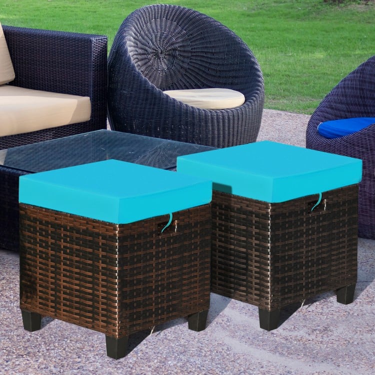Two-piece patio rattan ottoman set with turquoise removable cushions, perfect for outdoor seating and relaxation.