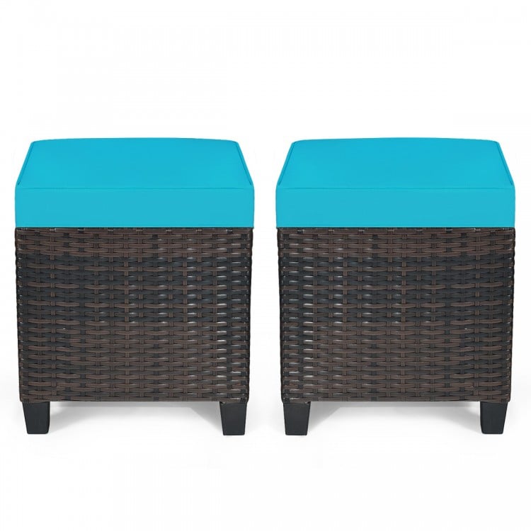 Turquoise cushion-top rattan ottomans with sturdy steel frame, perfect for outdoor seating or as a coffee table.