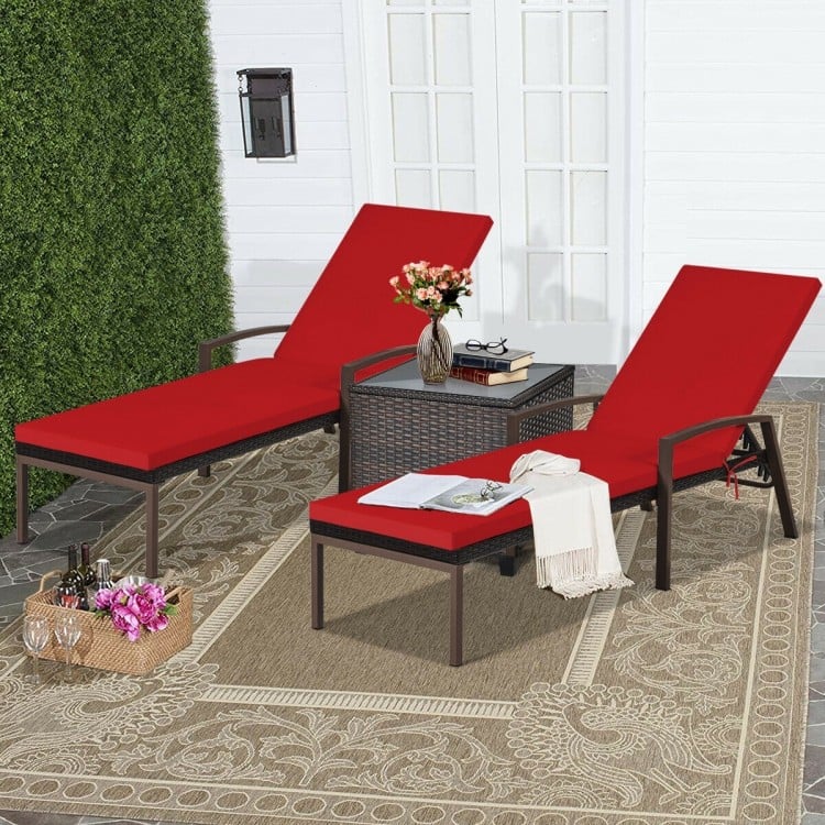 Red adjustable back lounge chairs with removable cushions and sturdy rattan, perfect for outdoor patio relaxation.