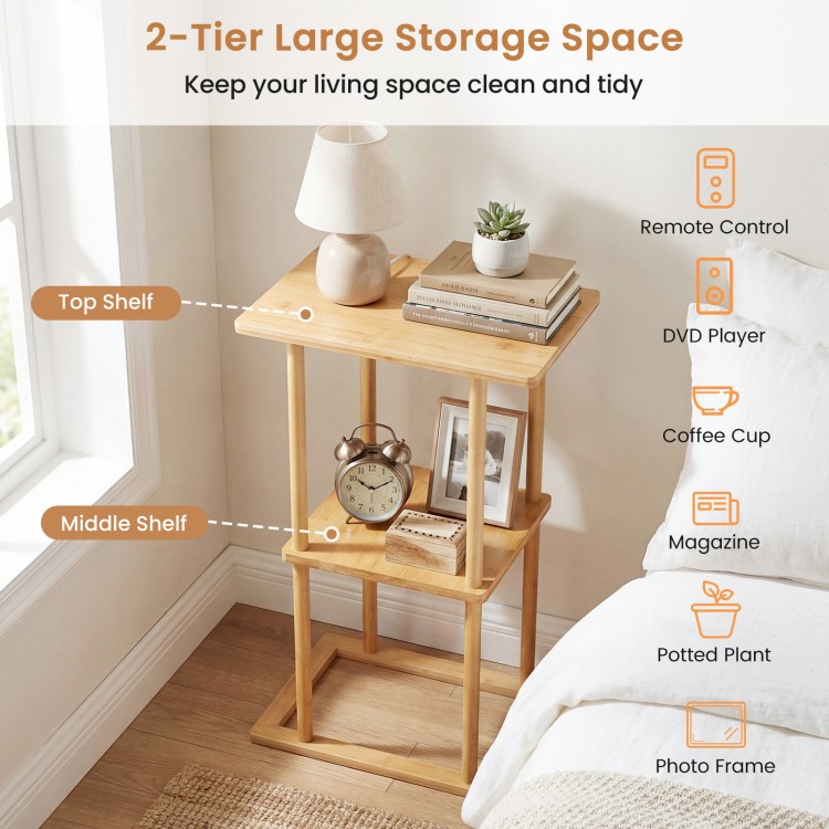 2-tier bamboo side table with storage shelves, perfect for remote controls and coffee cups in a tidy living space.