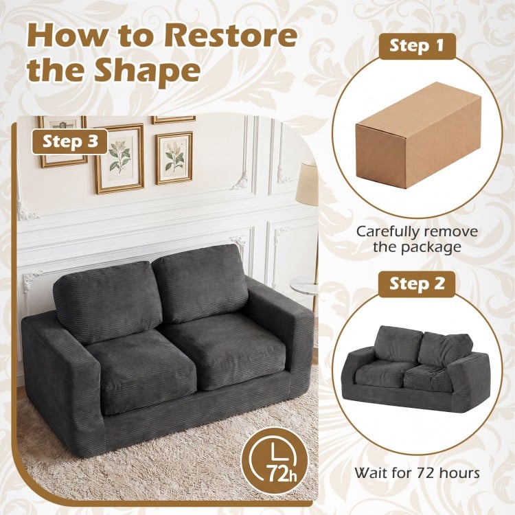 2-seater floor couch loveseat in black corduroy with removable cover, showing restoration steps for shape recovery.
