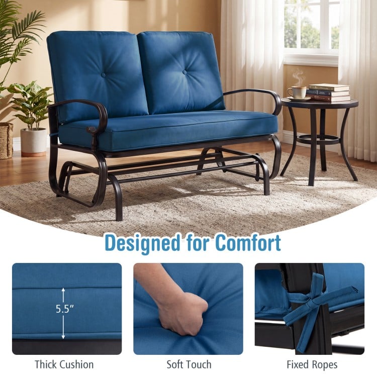 Two-seat outdoor swing glider chair in navy with thick cushions, designed for comfort and stability in patio settings.