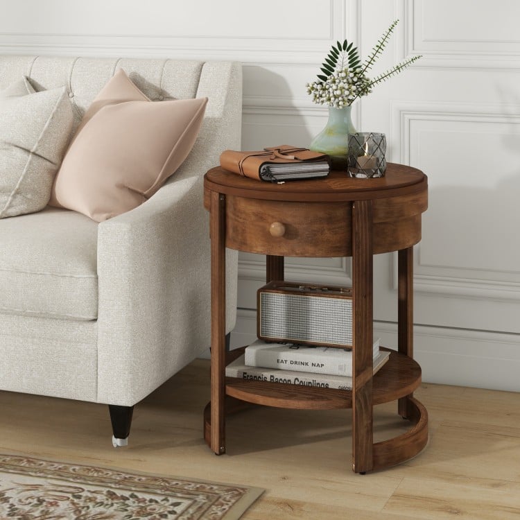 Round end table with drawer and lower shelf, featuring a rustic wood grain finish for stylish decor display.