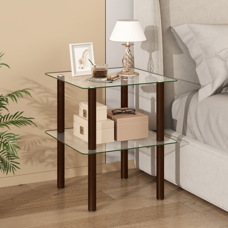 2-tier square end table with a clear tempered glass top and brown rubber wood legs, ideal for lamps and decorations.
