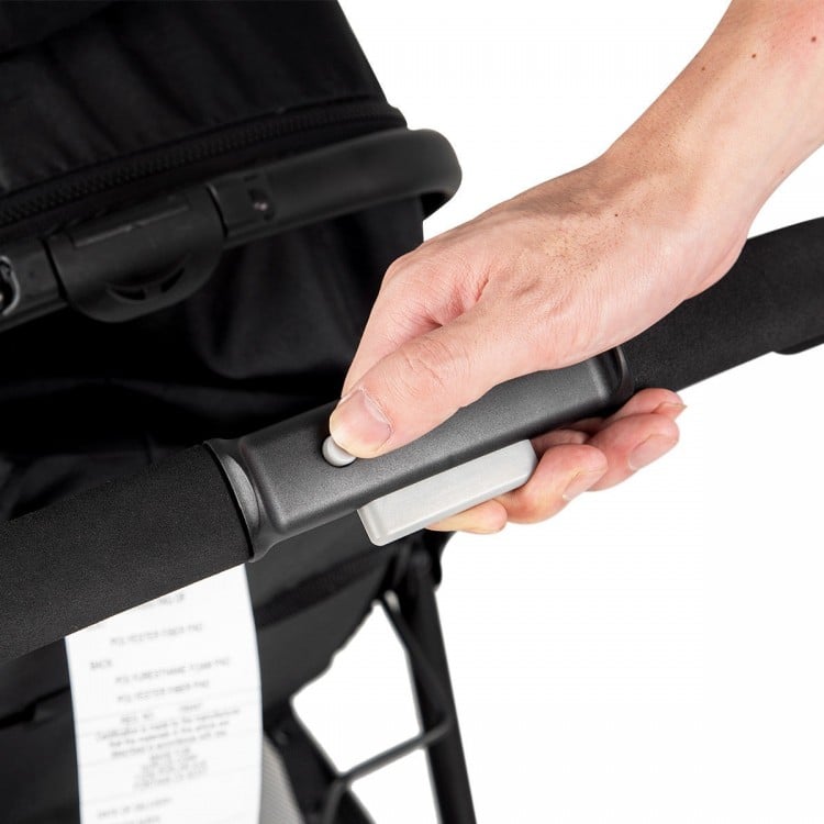 Close-up of the adjustable handle on the 2 in 1 foldable black baby stroller, featuring one-hand recline adjustment.
